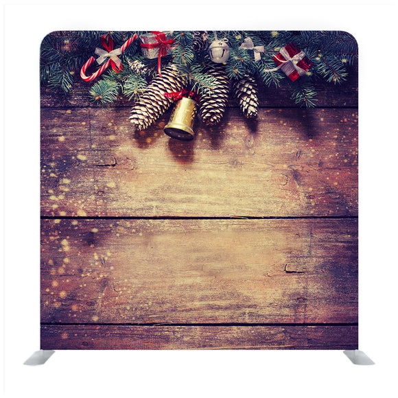 Christmas fir tree with decoration on dark wooden board Backdrop - Backdropsource